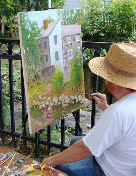 Artist Wiley Purkey takes part in Paint It! Ellicott City 2017 (HCAC photo)