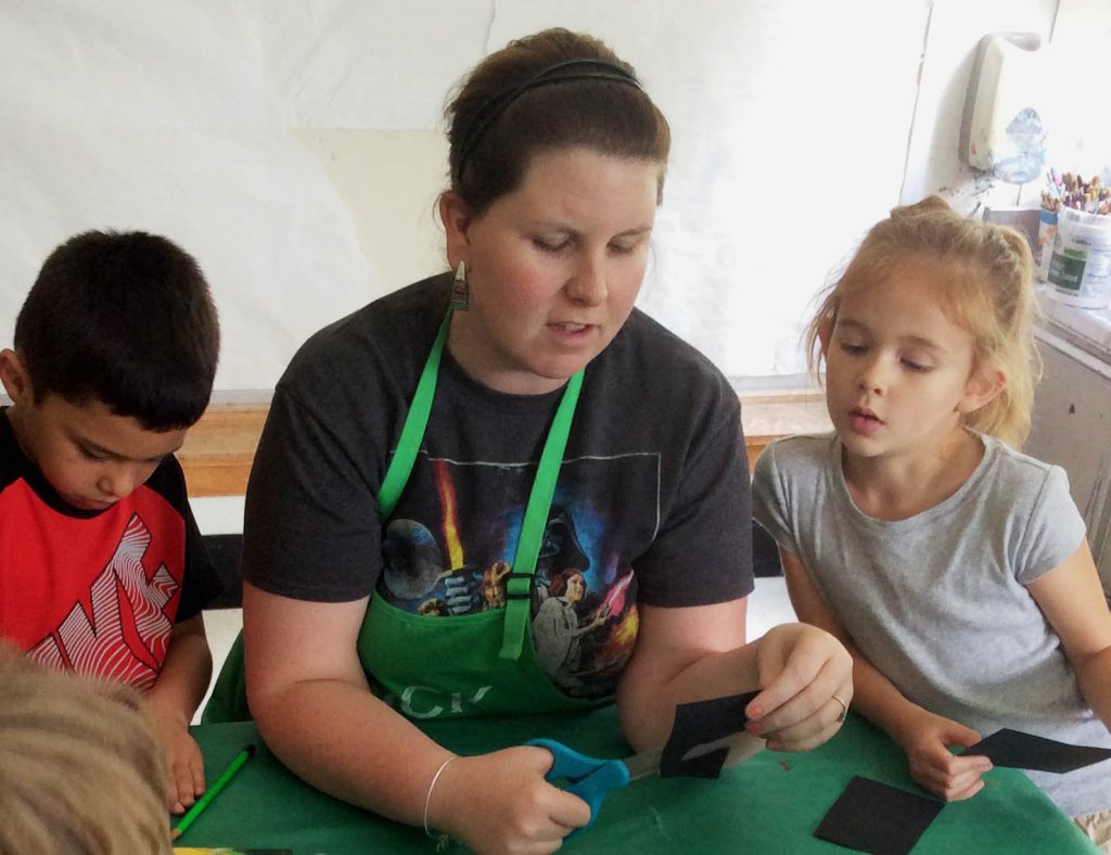 Instructor Katelyn Black works with summer campers (HCAC photo)
