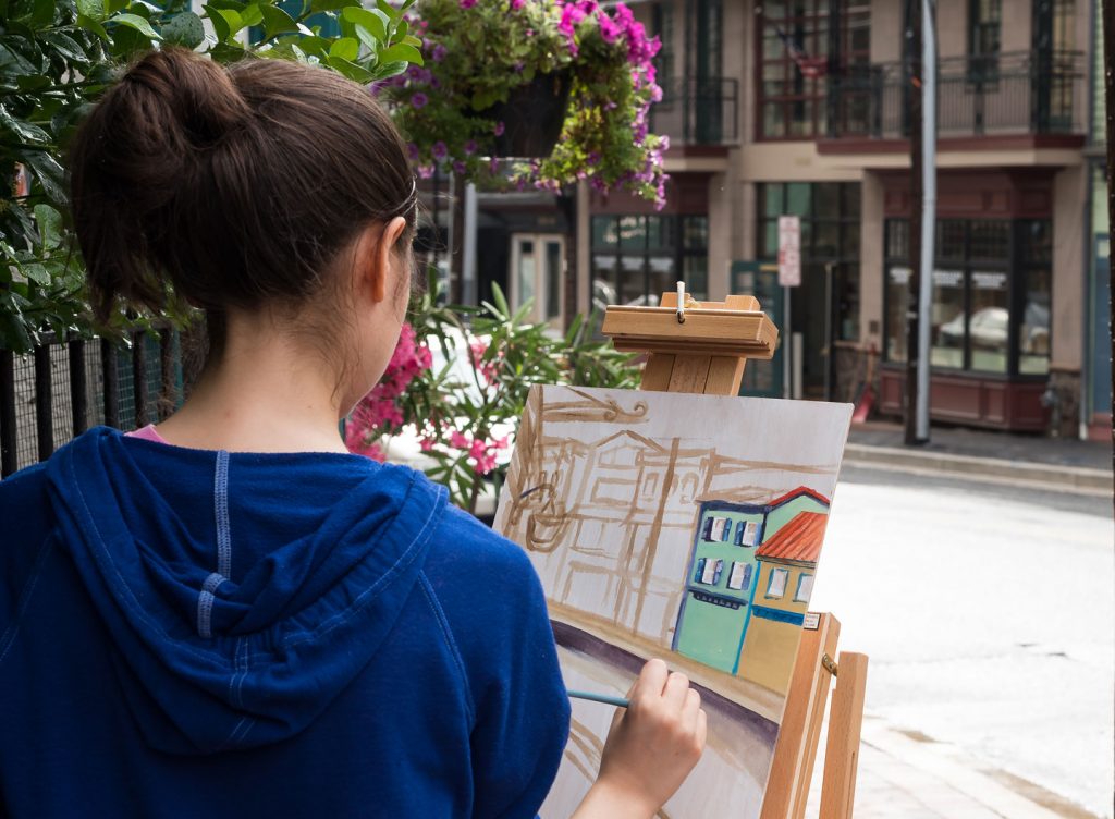 An Open Paint artist at work during Paint It! Ellicott City 2017 (Photo by Ray Urena)