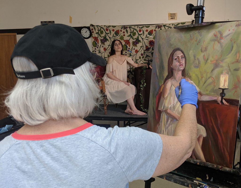 An artist takes part in HCAC’s drop-in Portrait Sessions. (HCAC photo)