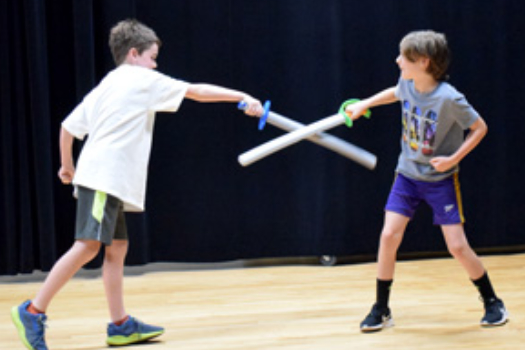Campers enjoy stage combat exercises during one of our Shakespeare camps (HCAC photo)
