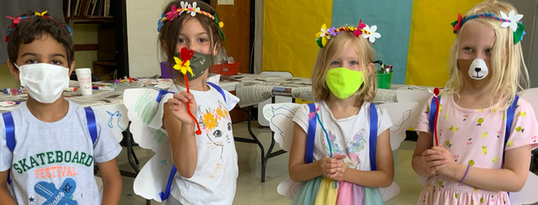 Summer campers from our Storytime Shakespeare: Magical Plays camp display the flower wreaths and wings they created for their performance (HCAC photo)