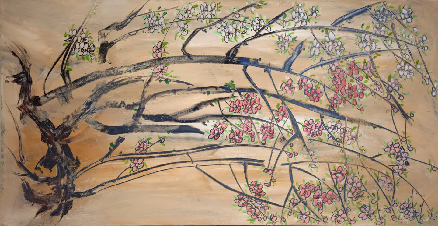 Tree branches extend to the right with small pink flowers blooming throughout.