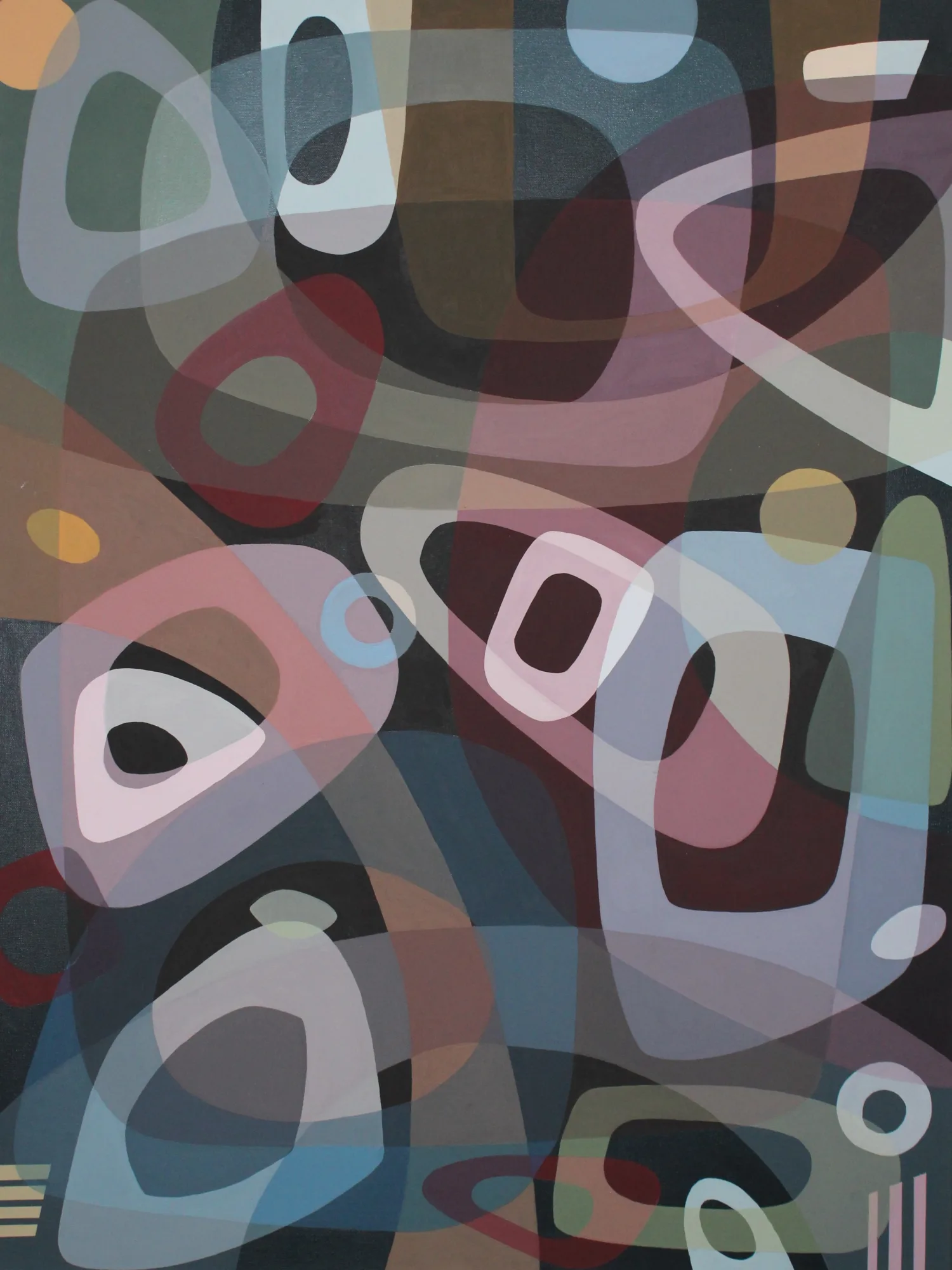 Colorful transparent abstract shapes lay overlapping each other.